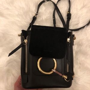 Black leather backpack with cute chain ring